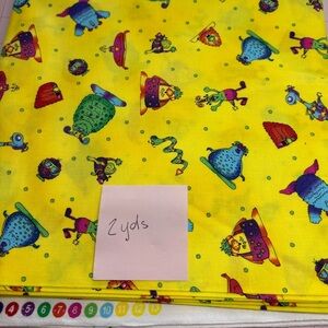 Monsters in The Closet - 2 yard cut of 100% cotton yellow with colorful monsters